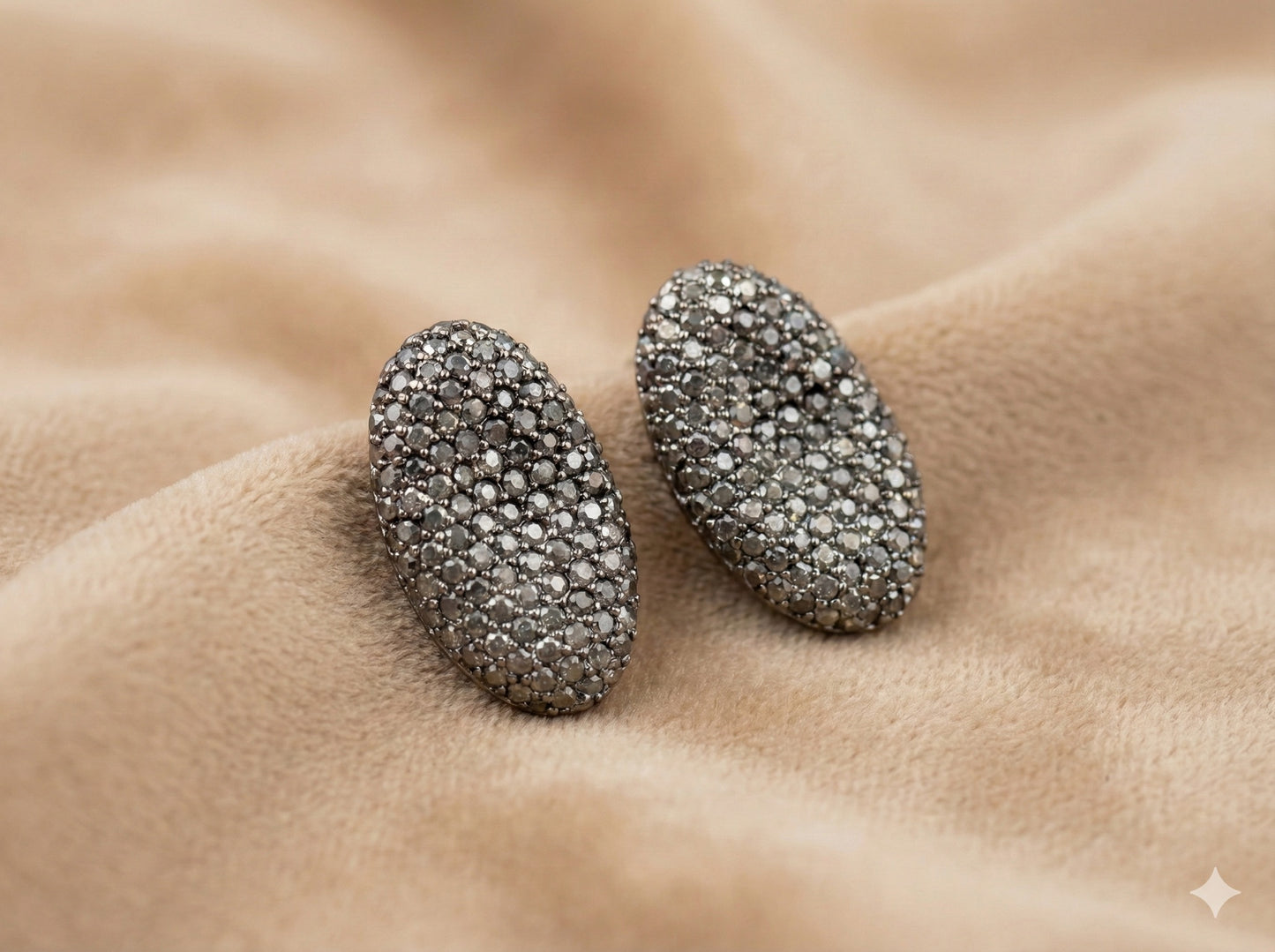 Oval Shaped Gray Finish Earrings studded with small crystals