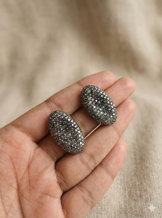 Oval Shaped Gray Finish Earrings studded with small crystals